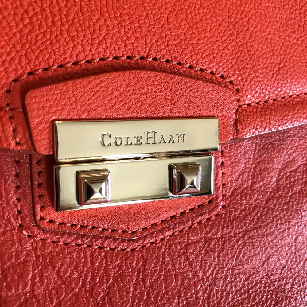Cole Haan Izzie leather clutch in Orange Pop